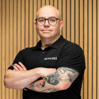 Headshot of man in Moventi T-shirt