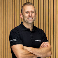 Headshot of man in Moventi T-shirt